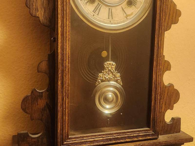 Vintage Ansonia Wall Clock in an Ornate Oak Casing