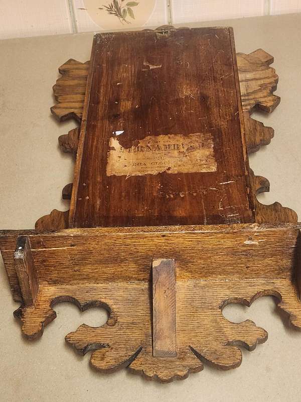 Vintage Ansonia Wall Clock in an Ornate Oak Casing