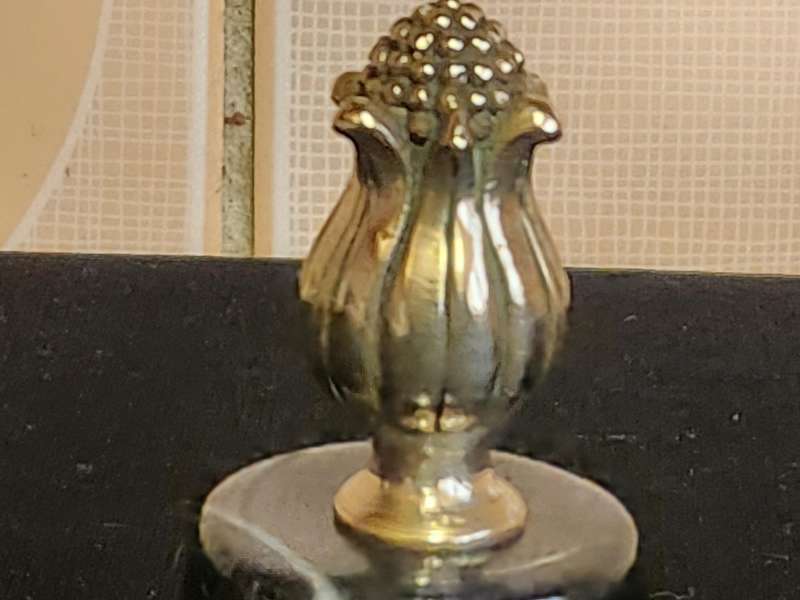 STUNNING ART DECO PAPERWEIGHT WITH A BRASS THISTLE ON SERPENTINE