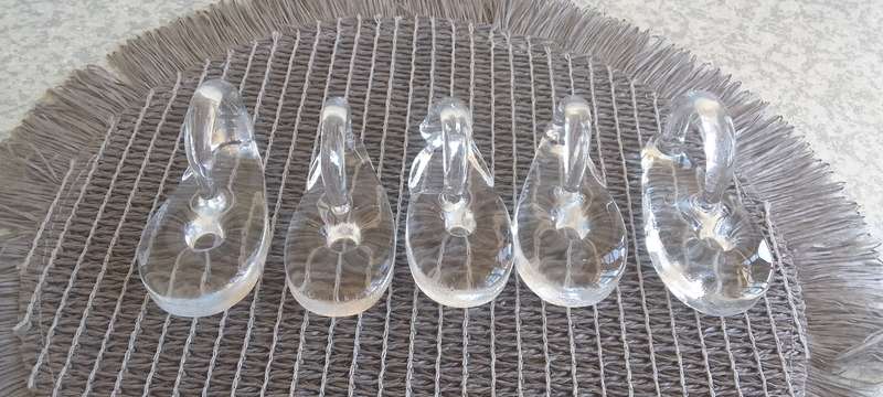 A Collection of Solid Clear Glass Candle Sticks Holders