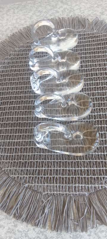 A Collection of Solid Clear Glass Candle Sticks Holders