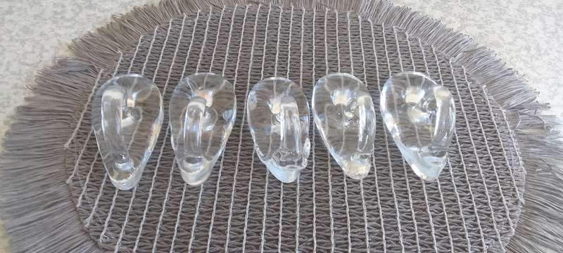 A Collection of Solid Clear Glass Candle Sticks Holders