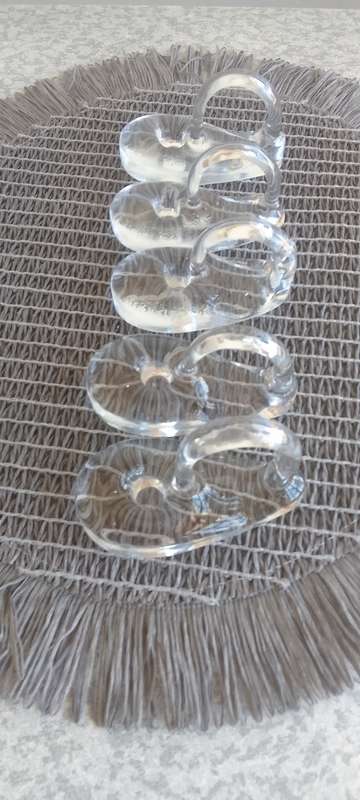 A Collection of Solid Clear Glass Candle Sticks Holders