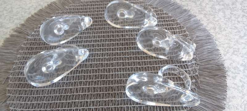 A Collection of Solid Clear Glass Candle Sticks Holders
