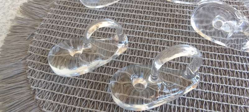 A Collection of Solid Clear Glass Candle Sticks Holders