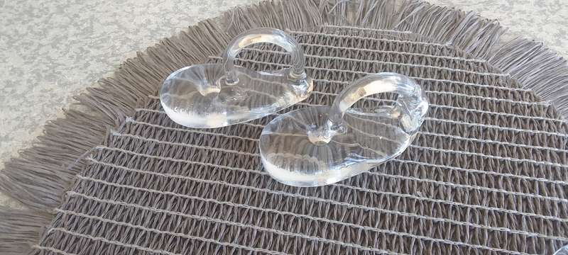 A Collection of Solid Clear Glass Candle Sticks Holders