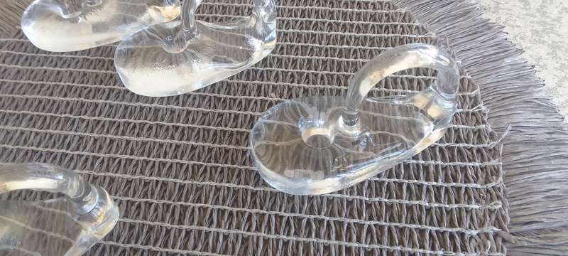 A Collection of Solid Clear Glass Candle Sticks Holders