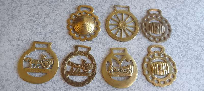 A Collection Of Brass Horse