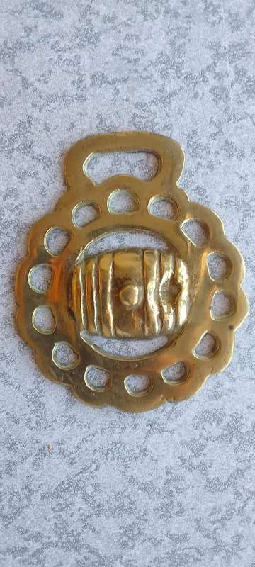 A Collection Of Brass Horse