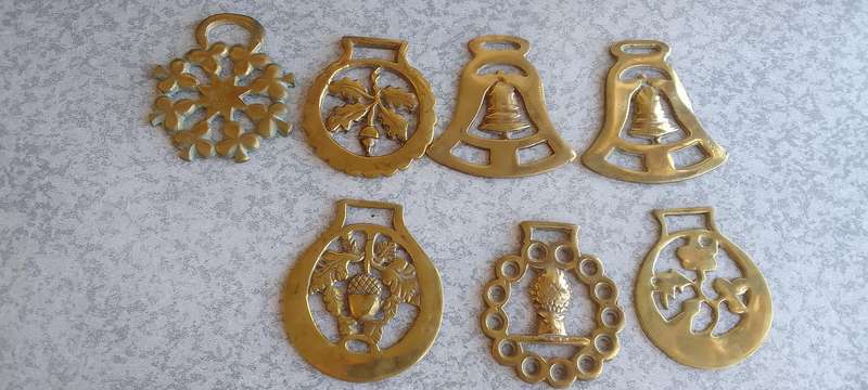 A Collection Of Brass Horse