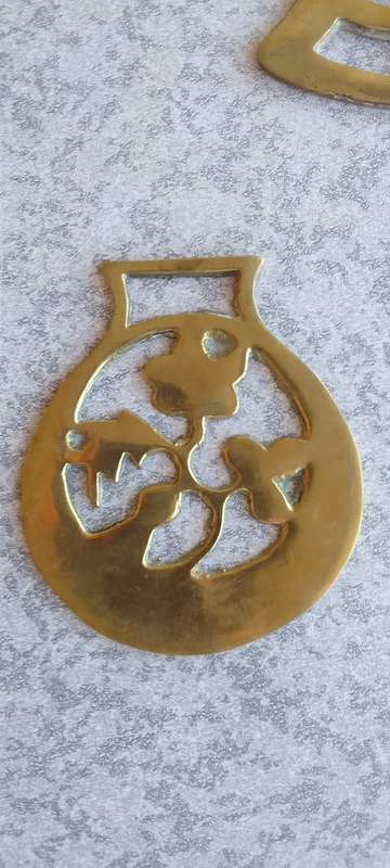 A Collection Of Brass Horse