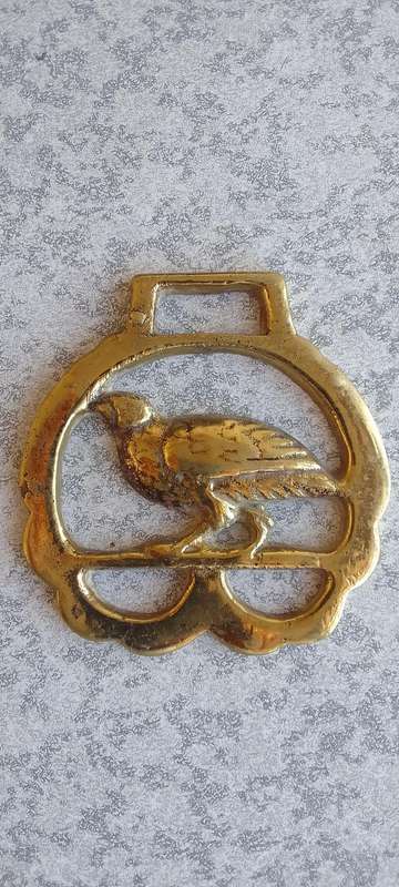 A Collection Of Brass Horse