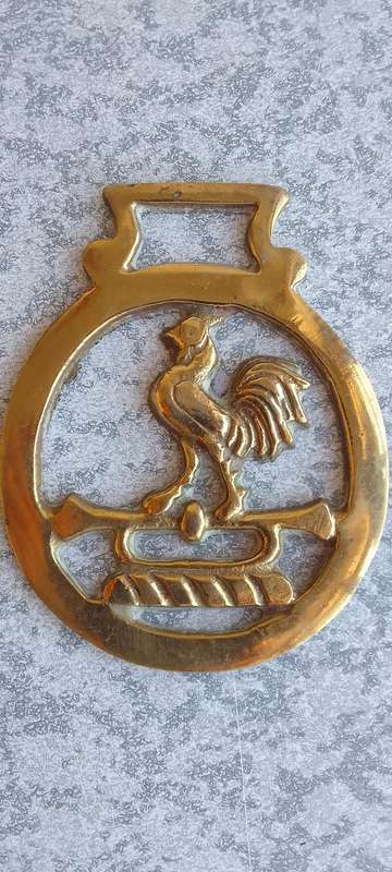A Collection Of Brass Horse