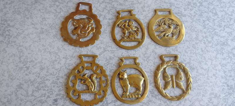 A Collection Of Brass Horse