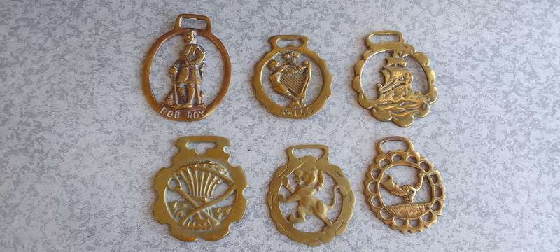 A Collection Of Brass Horse