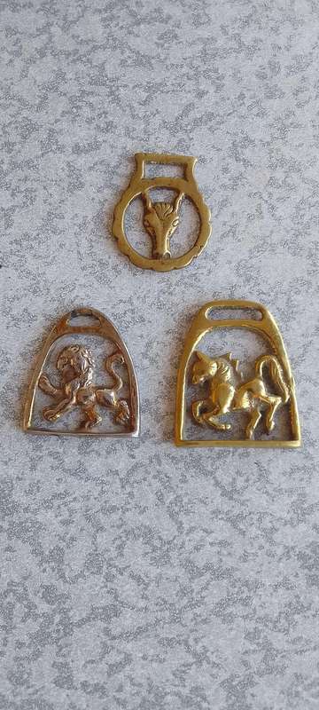 A Collection Of Mini Brass Horse