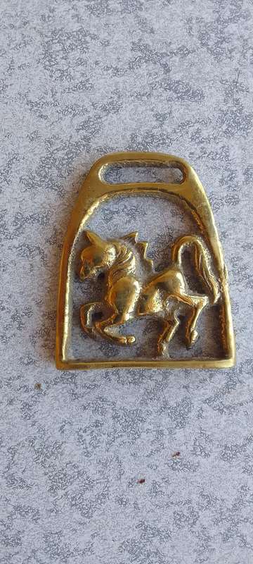 A Collection Of Mini Brass Horse