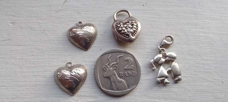 A Collection Of Silver - .925 Charms/pendants