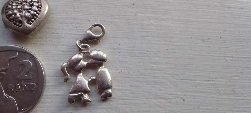 A Collection Of Silver - .925 Charms/pendants
