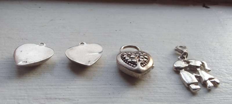 A Collection Of Silver - .925 Charms/pendants