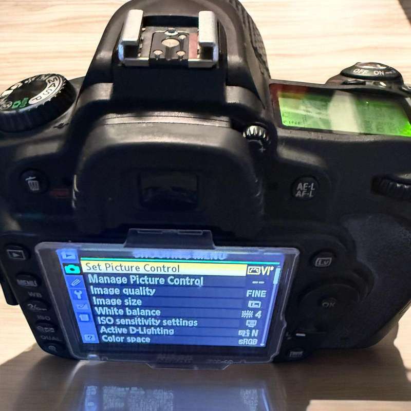 Nikon d90 with 18-105mm lense and flash