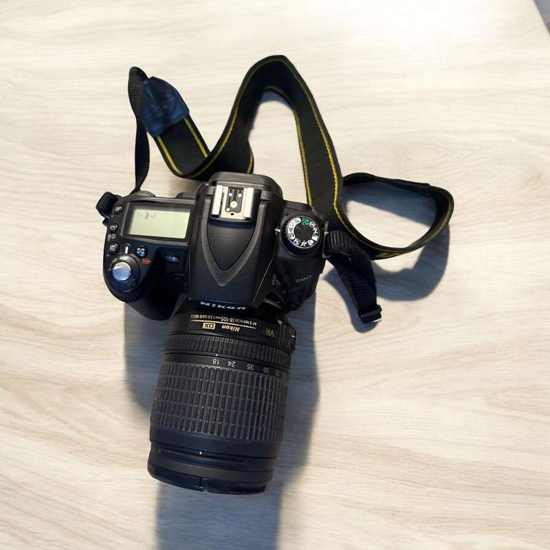 Nikon d90 with 18-105mm lense and flash