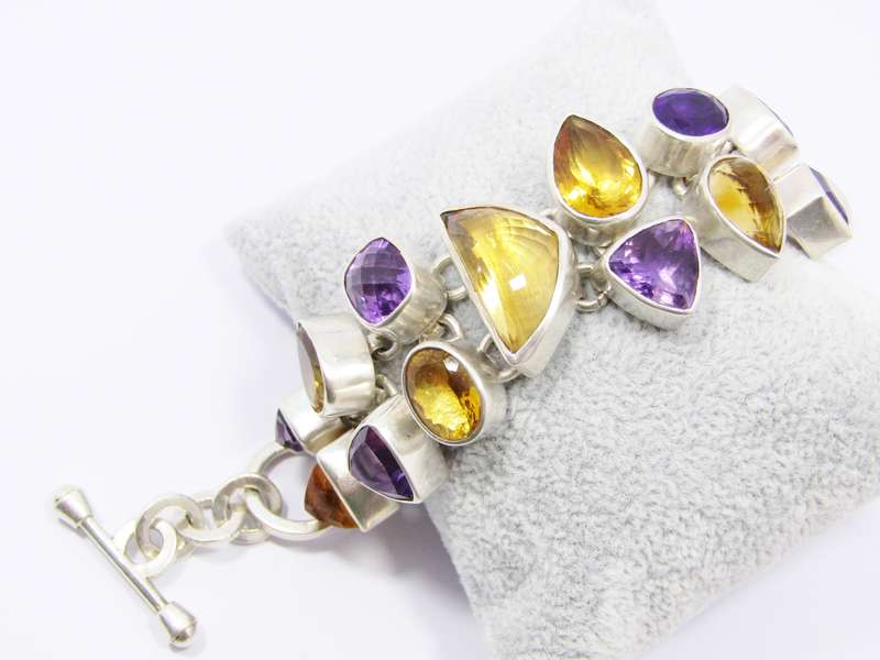A Stunning Huge Gemstone Bracelet Bracelet Set with Amethysts and Citrines in Sterling Silver.