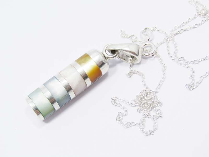 A Gorgeous Mother of Pearl Cylinder Design Pendant in Sterling Silver.