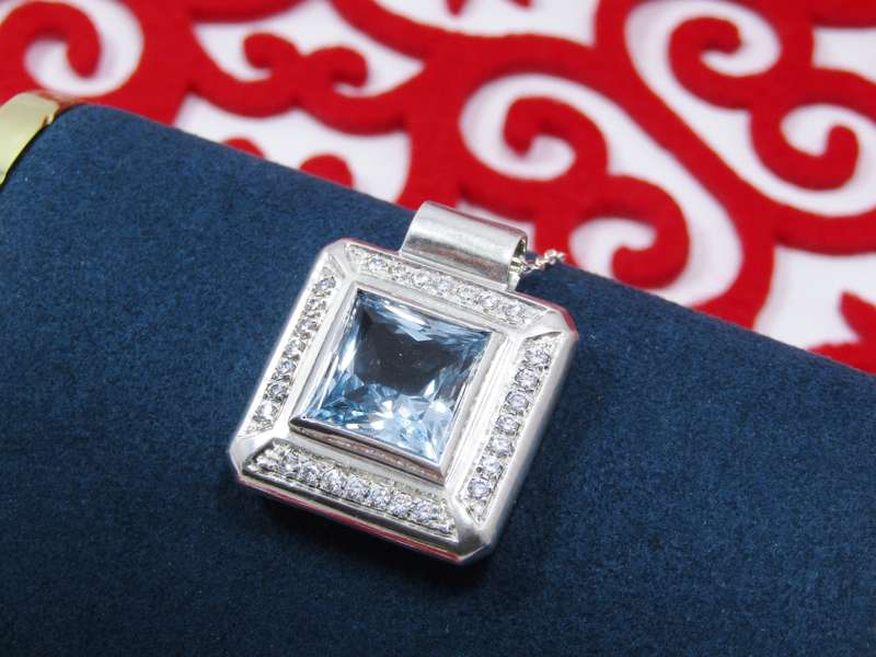 A Gorgeous Square Blue And Clear Zirconia Pendant on Chain in Sterling Silver.