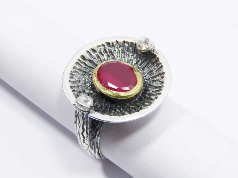A Stunning Two Tone Brass over Sterling Silver ring with a Synthetic Ruby in Sterling Silver.