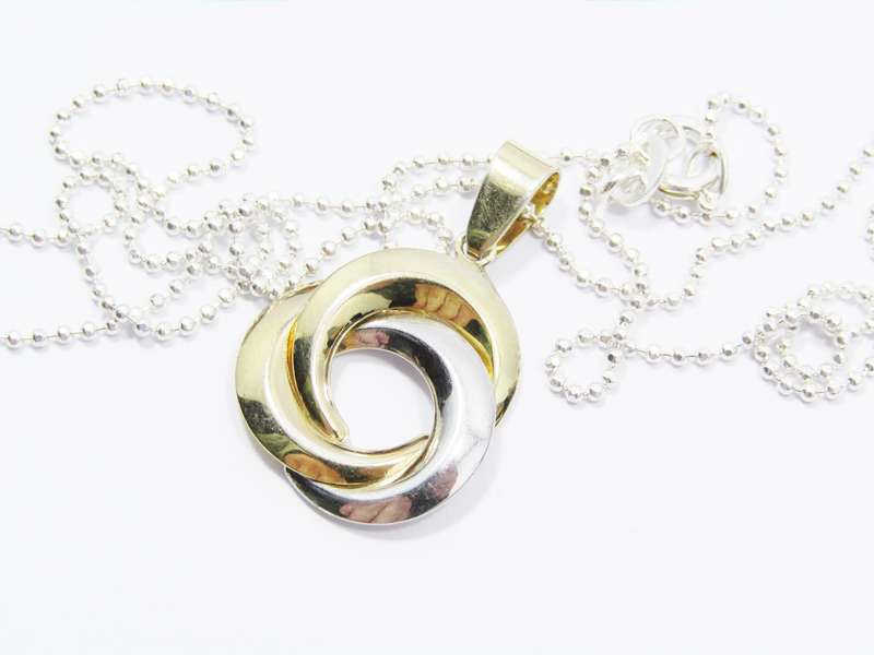 A Stunning Gold Gilt Over Sterling Silver Pendant on Chain