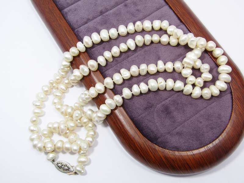 Lovely Long String of Freshwater Pearls with Silver Clasp