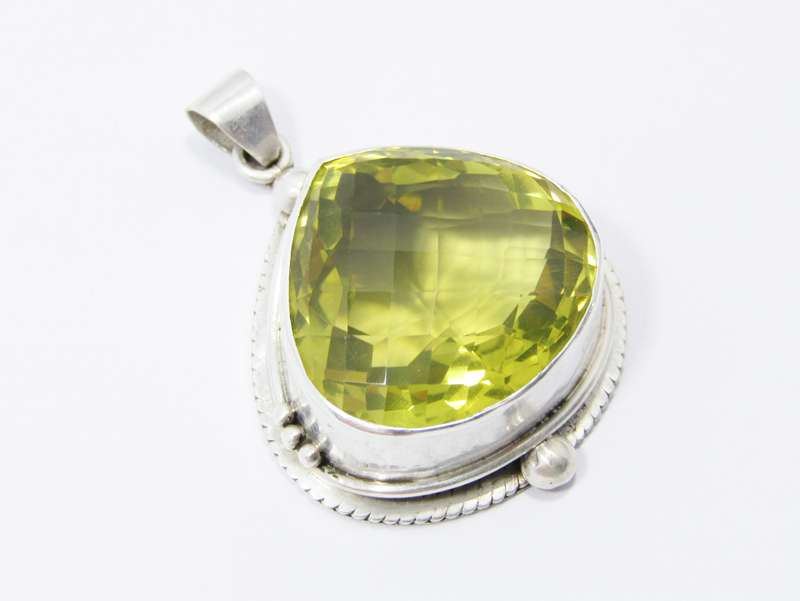 A Gorgeous Huge Faceted Lemon Quartz Pendant in Sterling Silver.