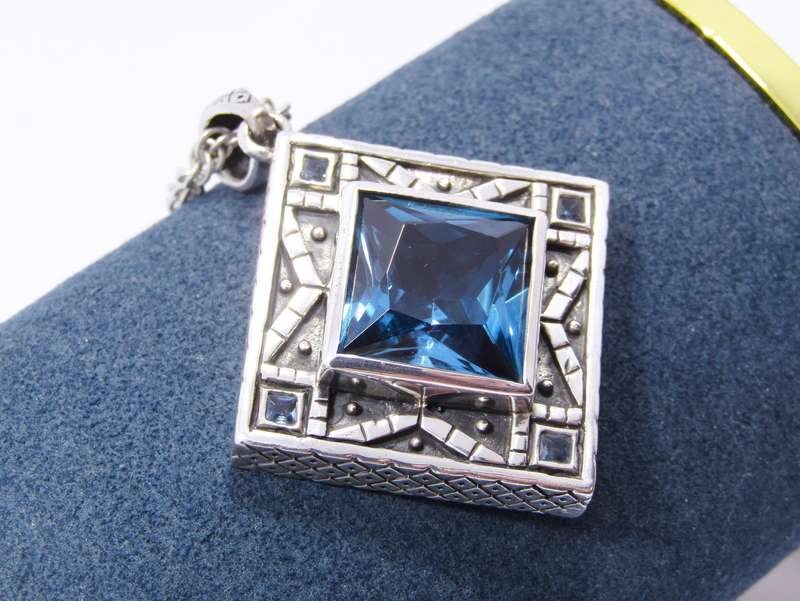 A Stunning Huge Vivid Blue Zirconia Pendant on Chain in Sterling Silver.
