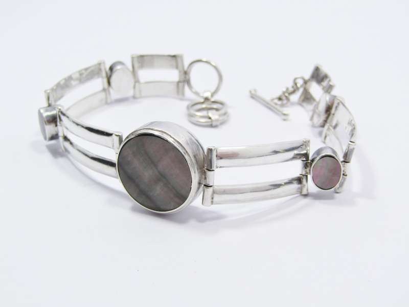 A Stunning Shell inlay Bracelet With a Fob Link Clasp in Sterling Silver