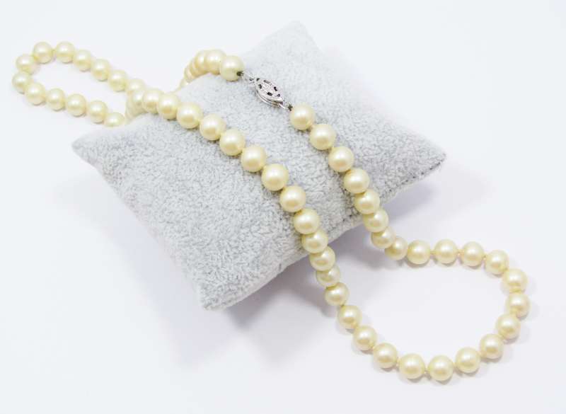 A Lovely String of  Vintage Faux Pearls with a Sterling Silver Clasp