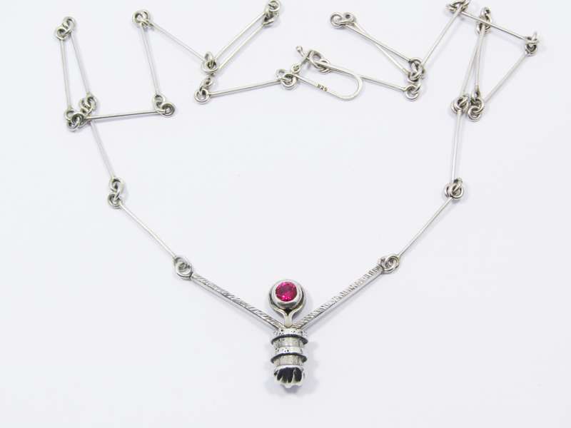 A Stunning Weighty Red Paste Stone Necklace in Sterling Silver