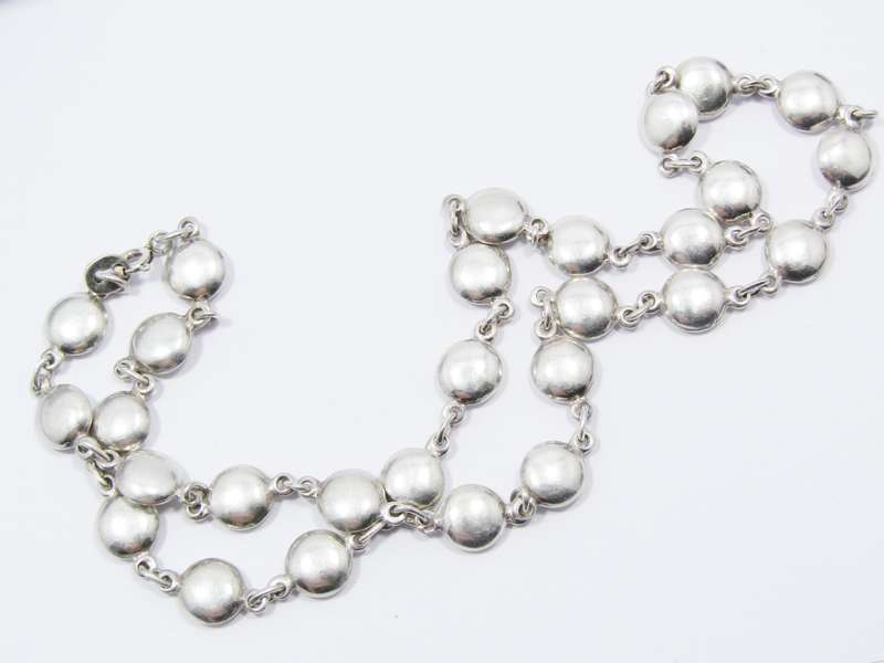 A Beautiful Smartie Design Necklace in Sterling Silver.