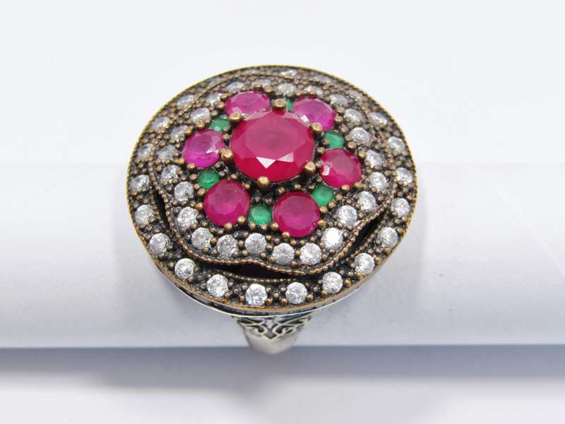 A Gorgeous Huge Eastern Design Ring Set With Pink, Green and White Crystals in Sterling Silver.