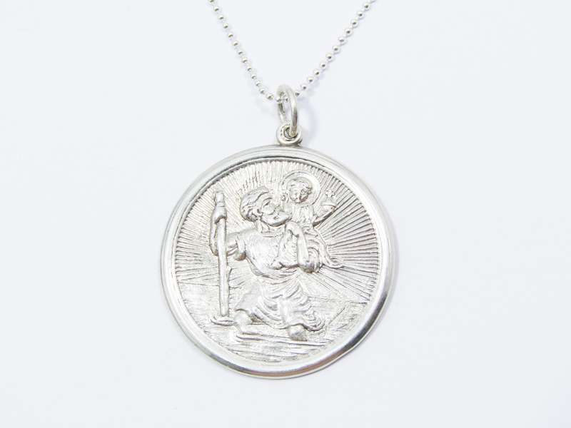 A Beautiful Detailed Round St Christopher Pendant on Chain in Sterling Silver.