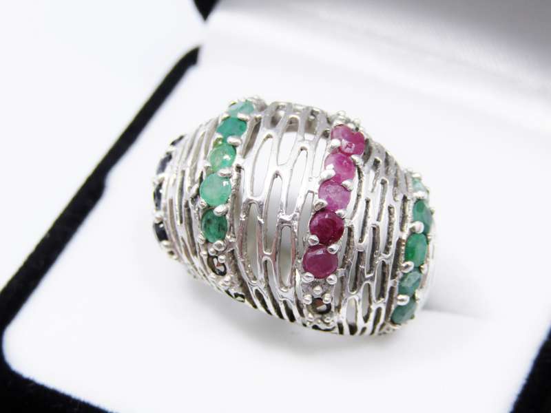 A Gorgeous Filigree Domed Ring Set With Opaque Gemstones in Sterling Silver.