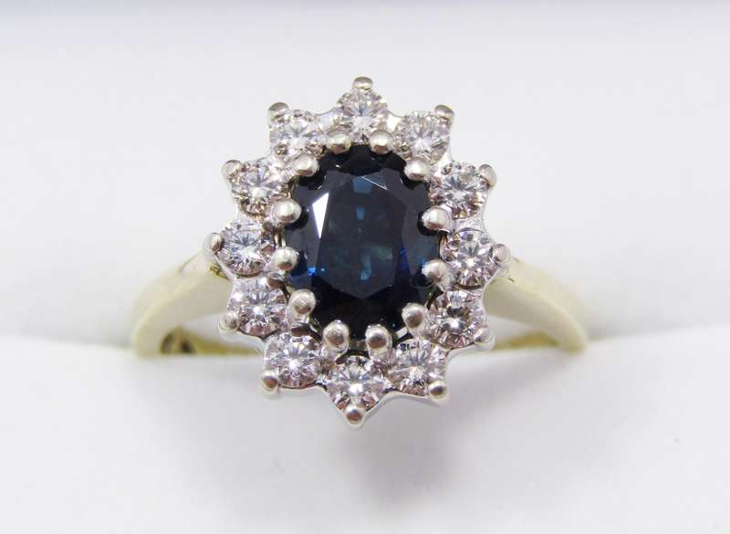 Captivating 18CT Gold, Sapphire & Diamond Halo Ring