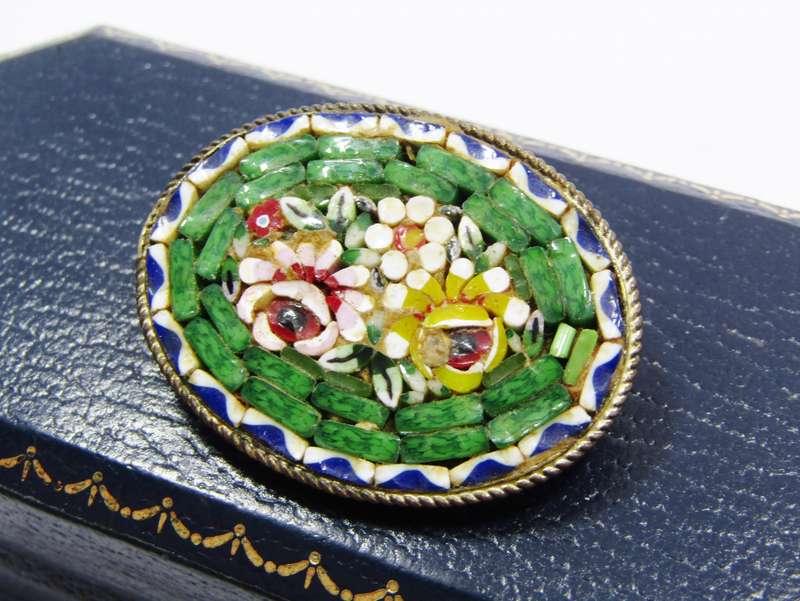 A Gorgeous Detailed Micro Mosaic Brooch With a brass tone Backing