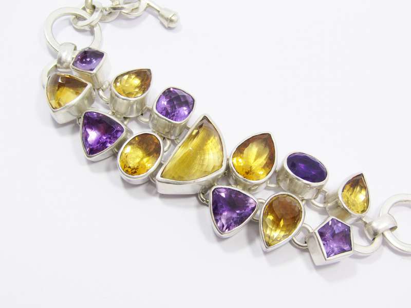 A Stunning Huge Gemstone Bracelet Bracelet Set with Amethysts and Citrines in Sterling Silver.