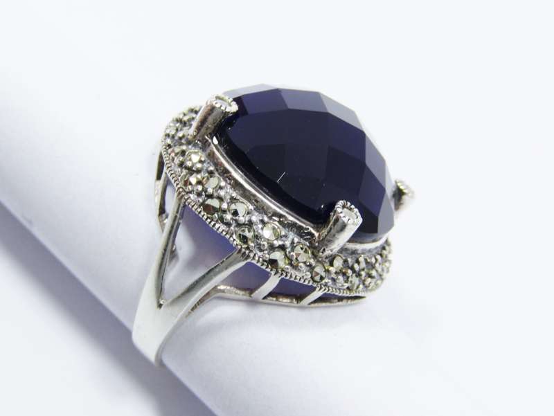 A Beautiful Large Faceted Blue Stone Ring With Marcasite's in Sterling Silver.