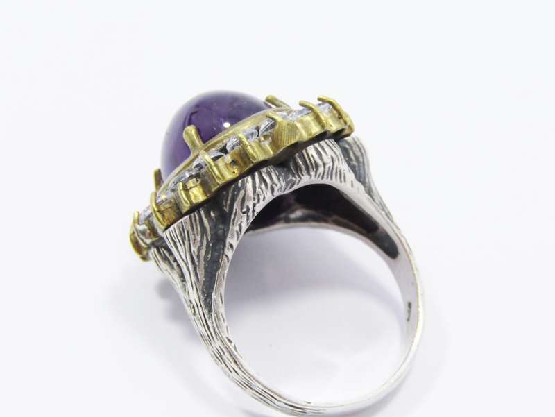 A Stunning Chunky Two Tone Cabochon Amethyst Surrounded With Clear Crystals in Sterling Silver