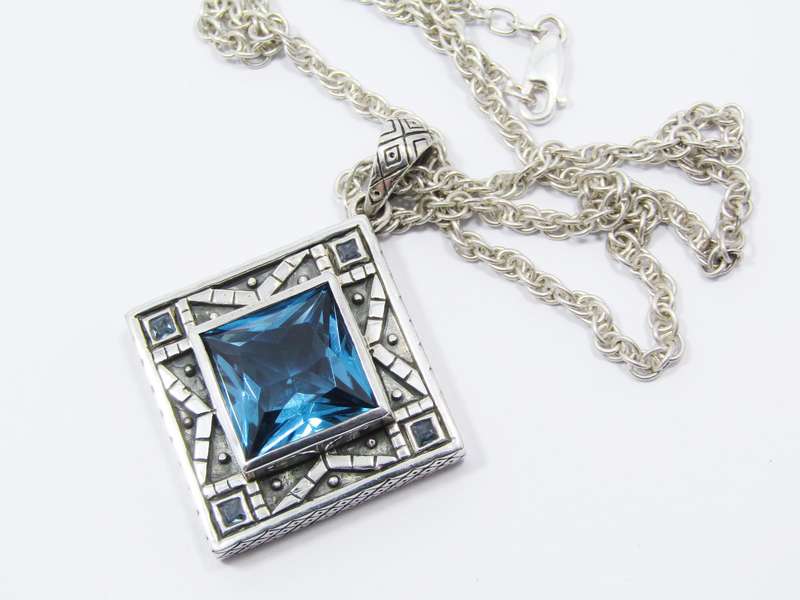 A Stunning Huge Vivid Blue Zirconia Pendant on Chain in Sterling Silver.