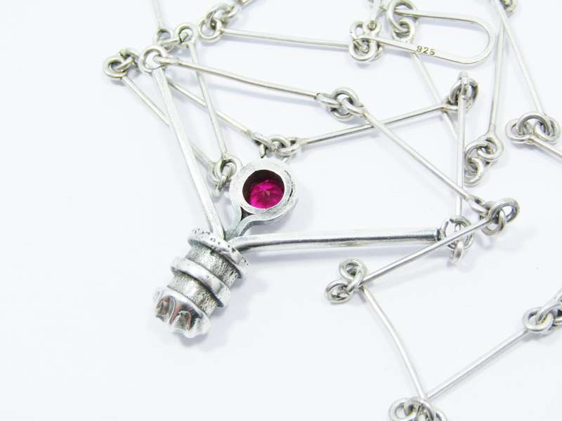 A Stunning Weighty Red Paste Stone Necklace in Sterling Silver
