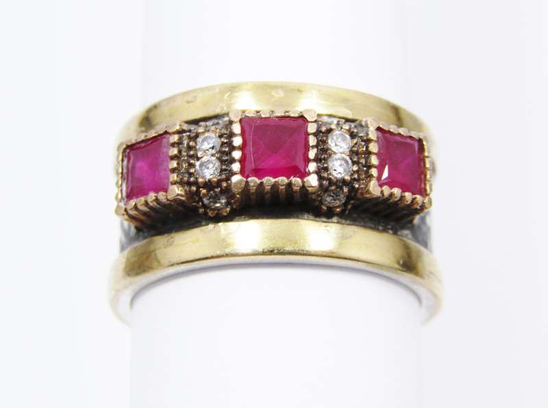 A Beautiful Weighty Three Stone Ring in a Copper over Sterling Silver.