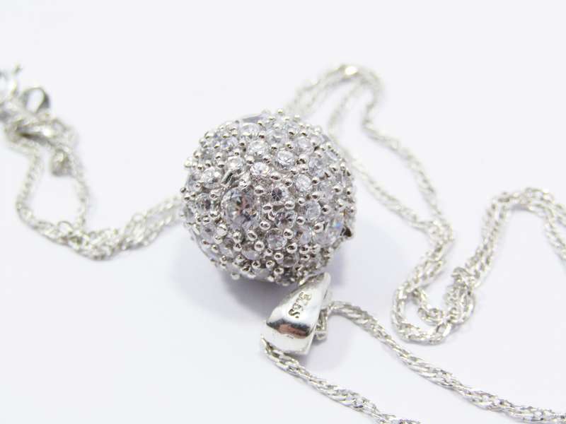 A Stunning Detailed Glitter Ball Pendant On Chain in Sterling Silver.